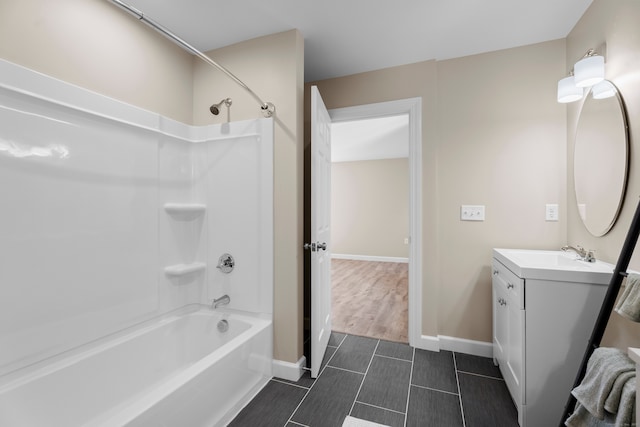 bathroom with  shower combination, vanity, and wood-type flooring