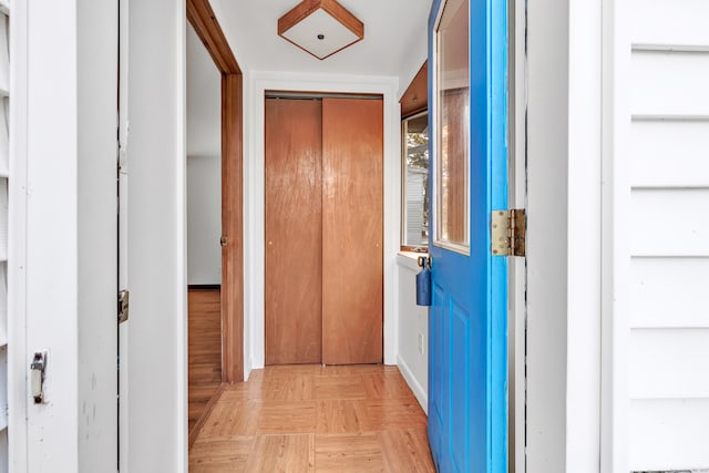 hallway with light parquet flooring