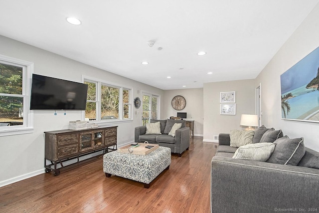 living room featuring dark hardwood / wood-style floors