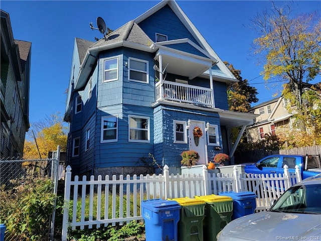 view of front of home with a balcony