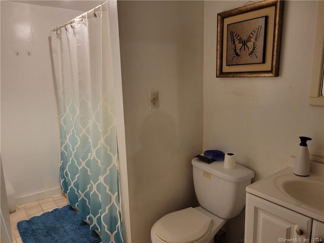 bathroom with vanity, toilet, tile patterned flooring, and a shower with shower curtain