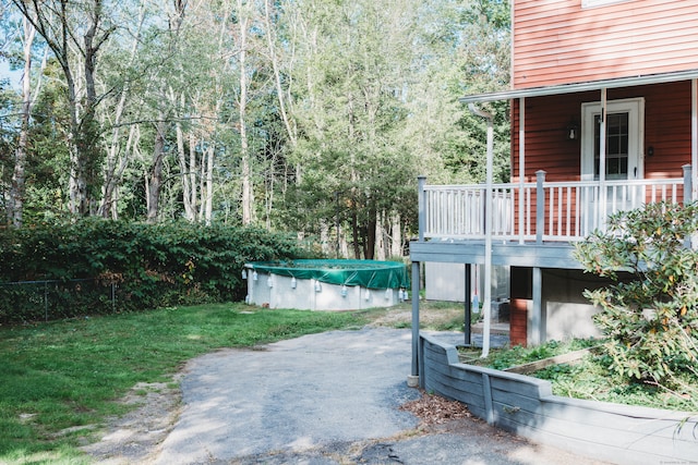 view of patio / terrace featuring a swimming pool side deck