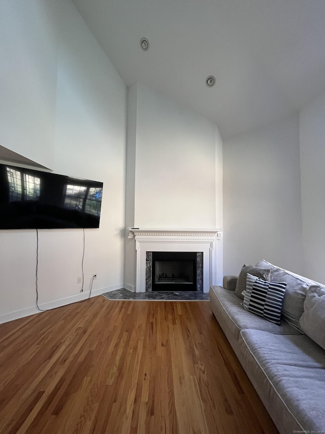 unfurnished living room featuring wood-type flooring