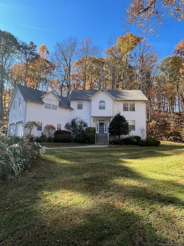 view of front of house with a front lawn