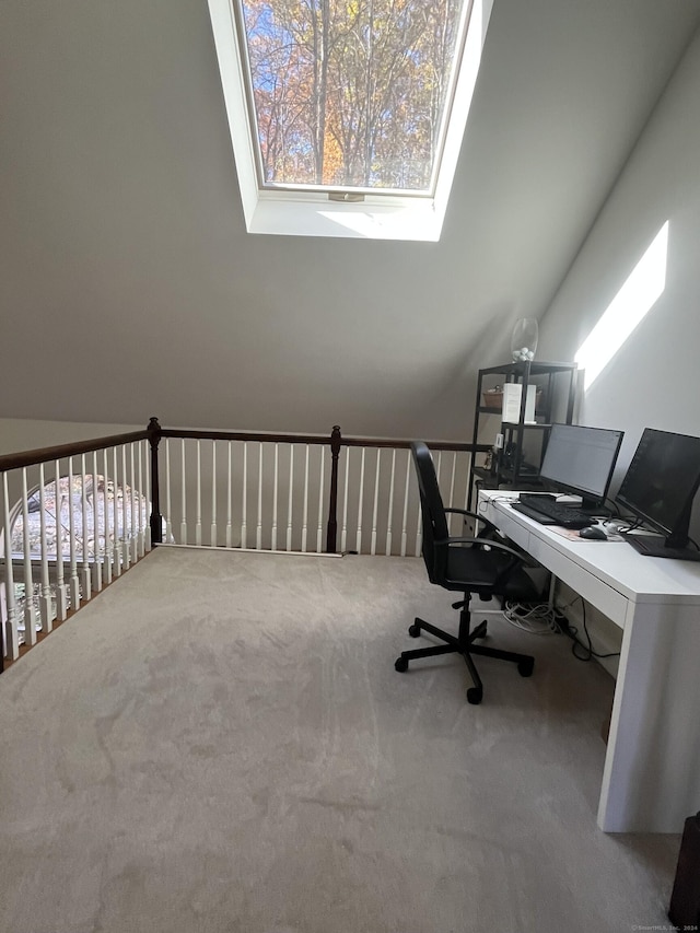 office area featuring carpet flooring and vaulted ceiling