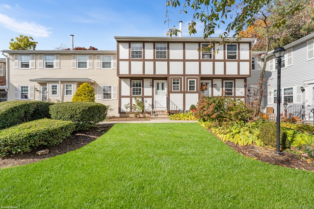 view of front of house with a front lawn