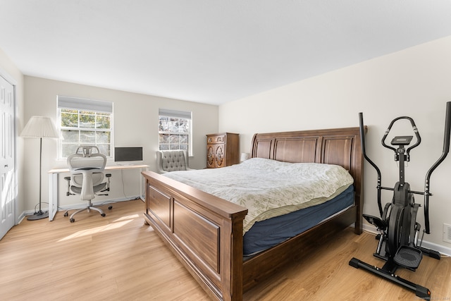 bedroom featuring light wood-type flooring