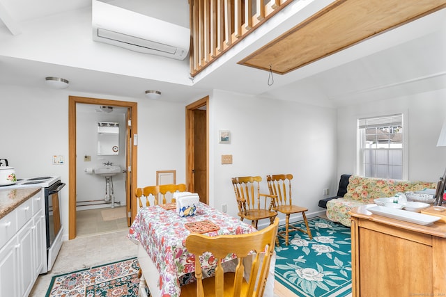 tiled dining area with a wall mounted air conditioner