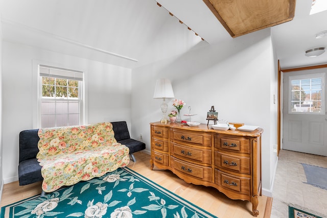 living area with light hardwood / wood-style flooring