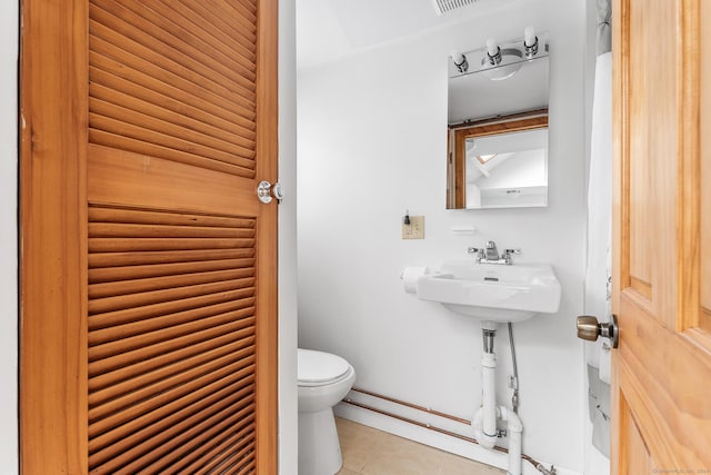 53 Breen Ave, Old Lyme, CT 06371 - half bath with toilet and tile patterned flooring
