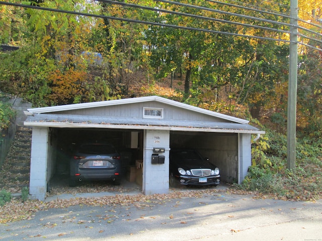 garage with a carport