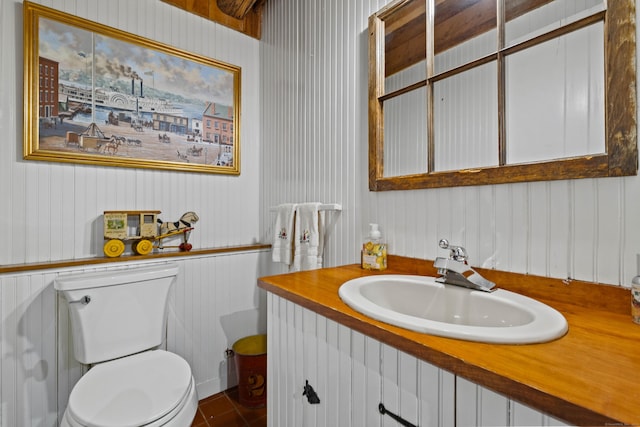 bathroom with vanity and toilet