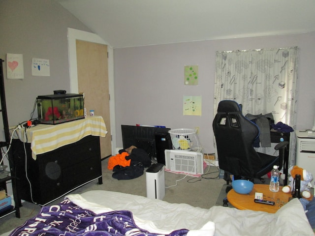 bedroom featuring lofted ceiling and carpet floors