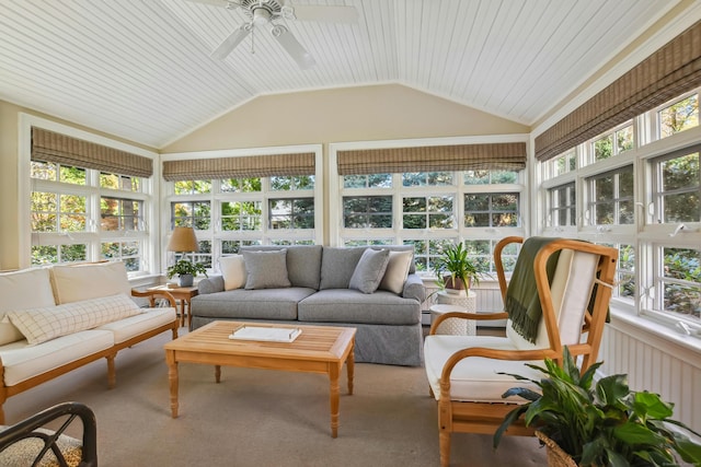 sunroom featuring lofted ceiling and ceiling fan