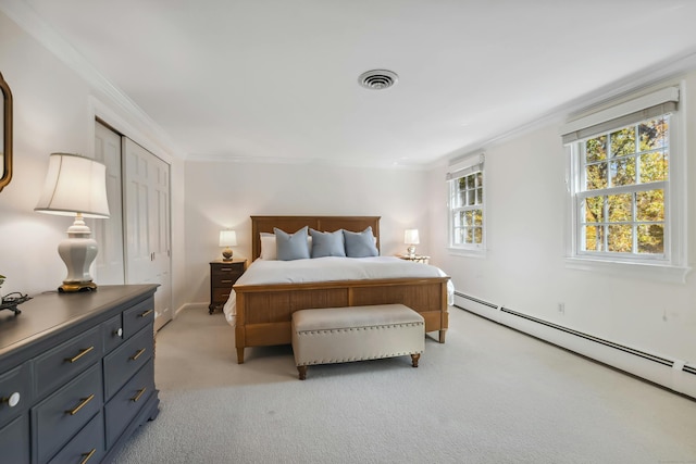 bedroom with light colored carpet, visible vents, baseboard heating, and ornamental molding