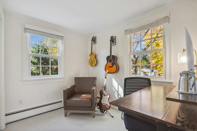 home office featuring carpet floors, a baseboard radiator, and a healthy amount of sunlight