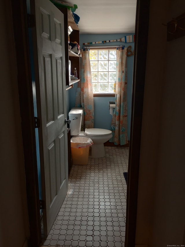 bathroom featuring toilet