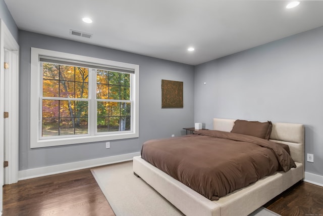 bedroom featuring dark hardwood / wood-style floors