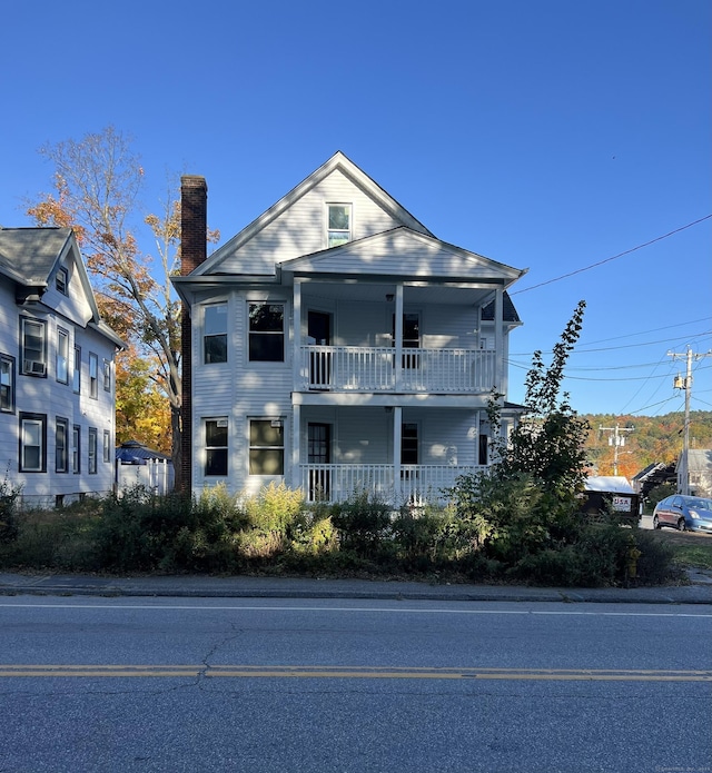 509 S Main St, Torrington, CT 06790 - greek revival inspired property with covered porch, a balcony, and a chimney