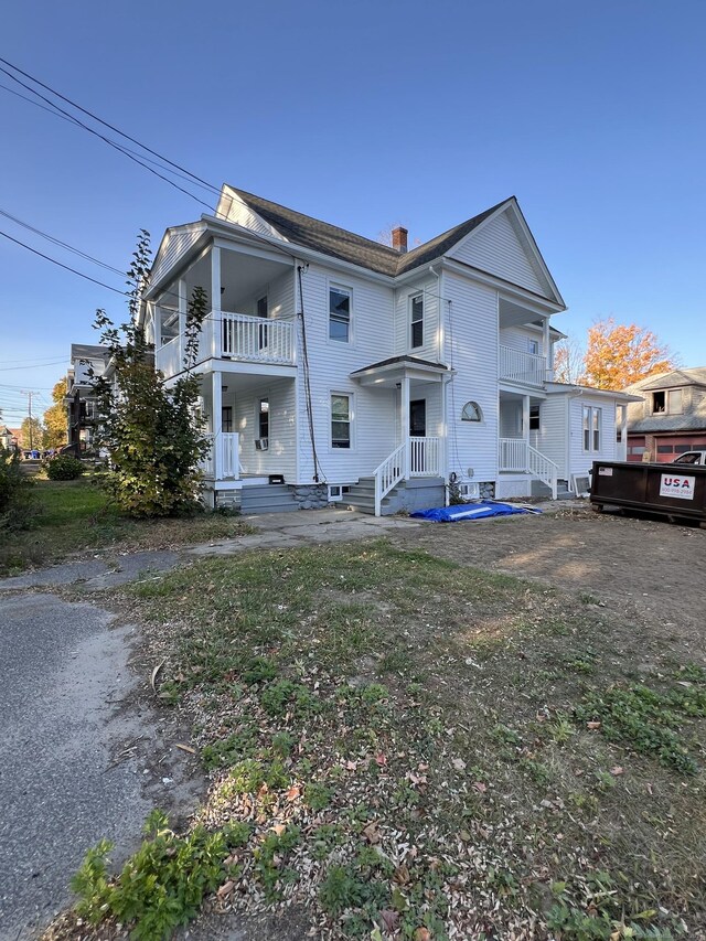 509 S Main St, Torrington, CT 06790 - back of house with a chimney and a balcony