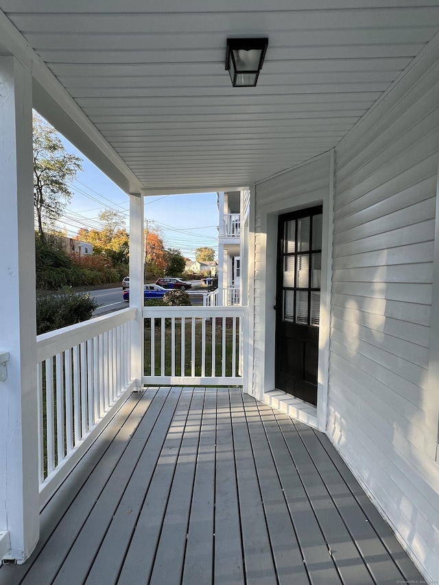 509 S Main St, Torrington, CT 06790 - wooden deck with a carport