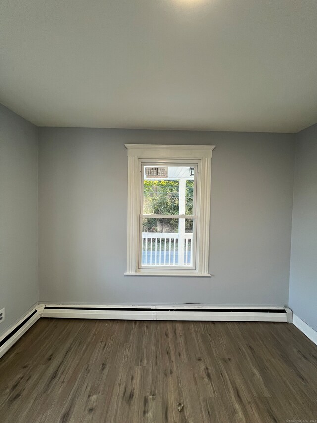 empty room featuring dark hardwood / wood-style floors