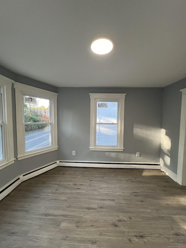 509 S Main St, Torrington, CT 06790 - empty room featuring wood finished floors and baseboards