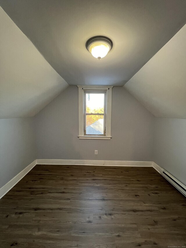 509 S Main St, Torrington, CT 06790 - additional living space featuring lofted ceiling, a baseboard radiator, dark wood-style floors, and baseboards