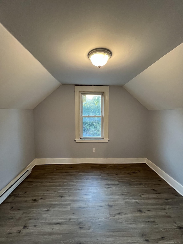 509 S Main St, Torrington, CT 06790 - additional living space with baseboards, wood finished floors, a baseboard heating unit, and vaulted ceiling