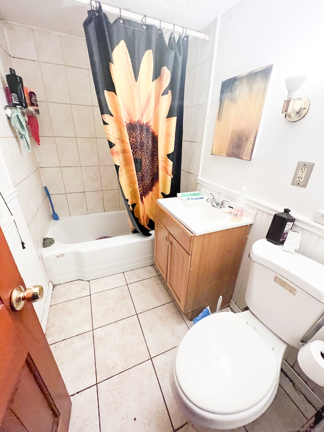 full bathroom with tile patterned flooring, vanity, toilet, and shower / bathtub combination with curtain