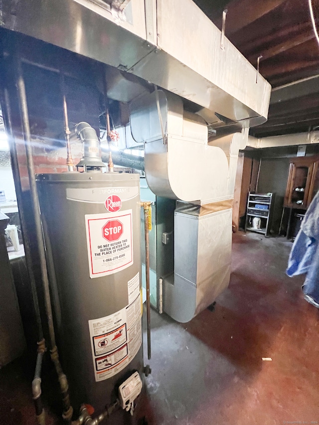 utility room featuring water heater and heating unit