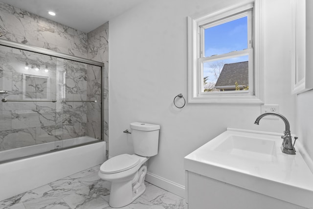 full bathroom with combined bath / shower with glass door, vanity, and toilet