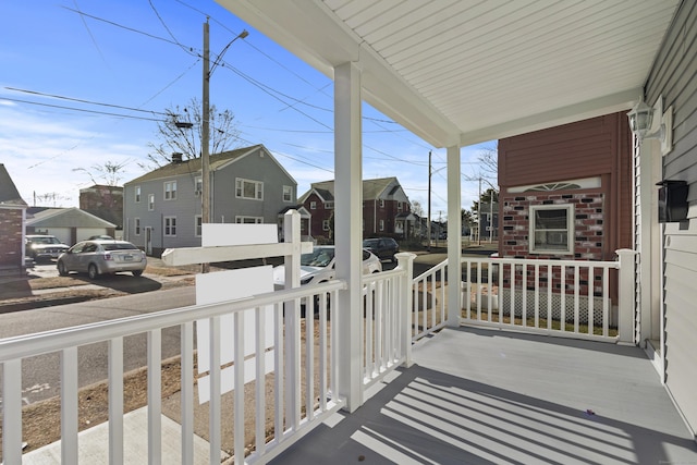 balcony featuring covered porch