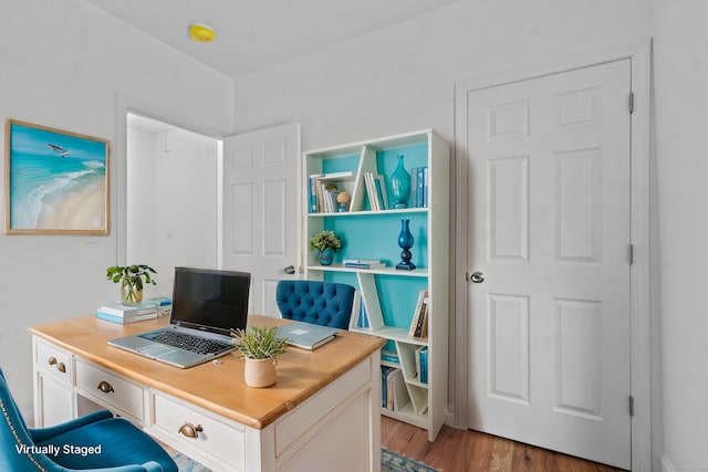 home office featuring light hardwood / wood-style floors