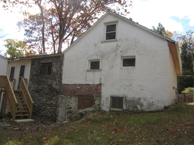 back of house with cooling unit