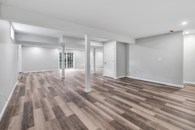 basement featuring wood-type flooring