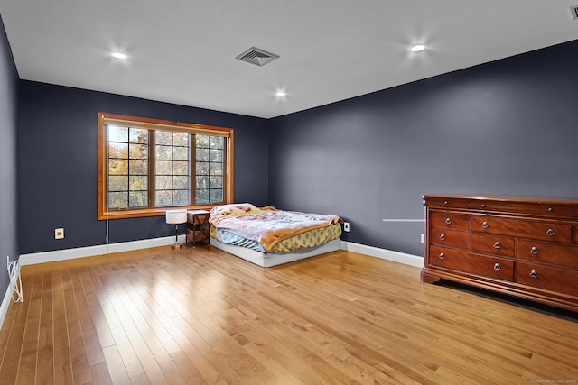 unfurnished bedroom featuring light hardwood / wood-style flooring