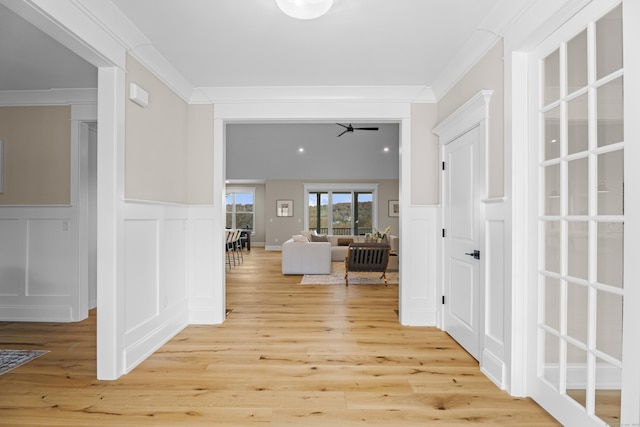 167 Willow Creek Estates Dr, Southbury, CT 06488 - hall with a decorative wall, crown molding, light wood-style floors, and a wainscoted wall