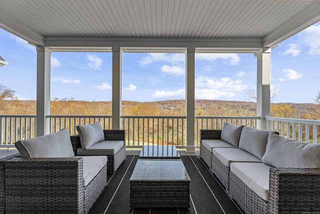 sunroom with plenty of natural light