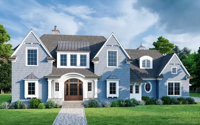 view of front of home featuring a front yard