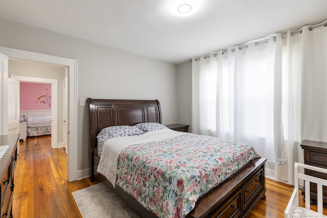 bedroom featuring hardwood / wood-style flooring