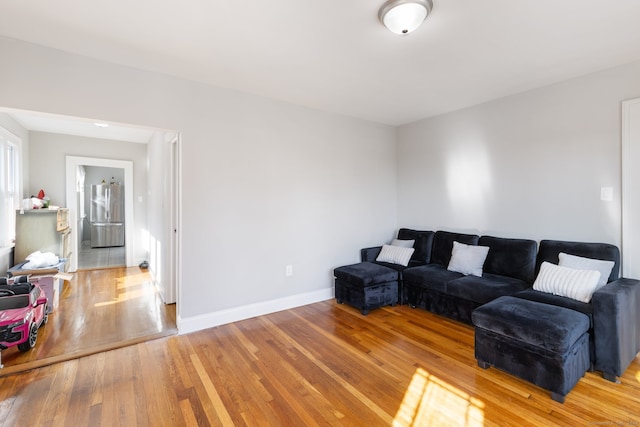 living room with light hardwood / wood-style floors