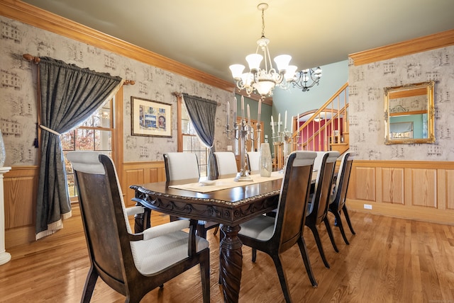 18 Eastern Ln, New Milford, CT 06776 - dining space with a chandelier, a wainscoted wall, wallpapered walls, wood finished floors, and stairs