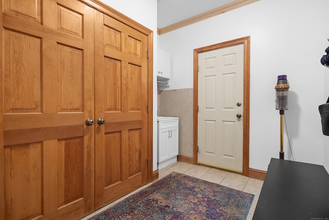 18 Eastern Ln, New Milford, CT 06776 - entryway featuring light tile patterned floors and crown molding