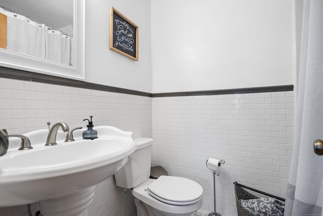 18 Eastern Ln, New Milford, CT 06776 - bathroom featuring tile walls and a wainscoted wall