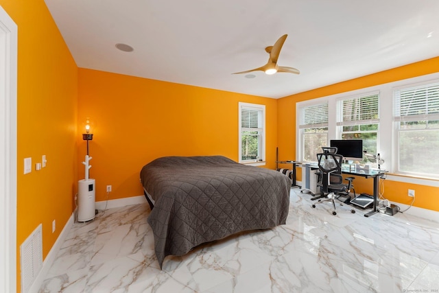 bedroom with marble finish floor, baseboards, multiple windows, and visible vents