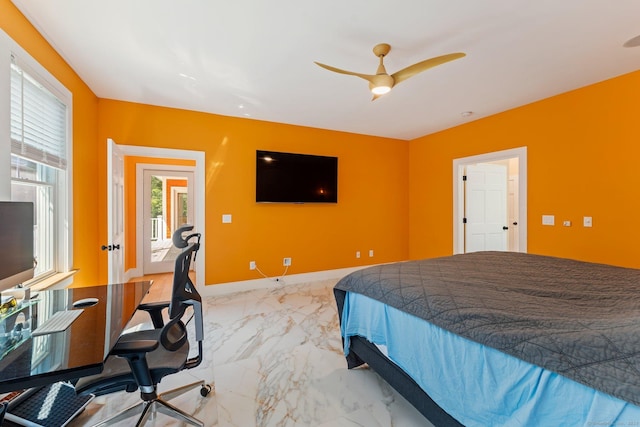 bedroom featuring marble finish floor, ceiling fan, and baseboards