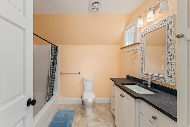 bathroom with baseboards, toilet, vaulted ceiling, shower / bath combo with shower curtain, and vanity