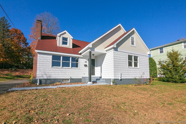 view of front of property featuring a front yard