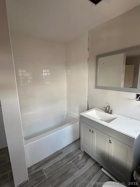 bathroom featuring vanity and shower / bathtub combination